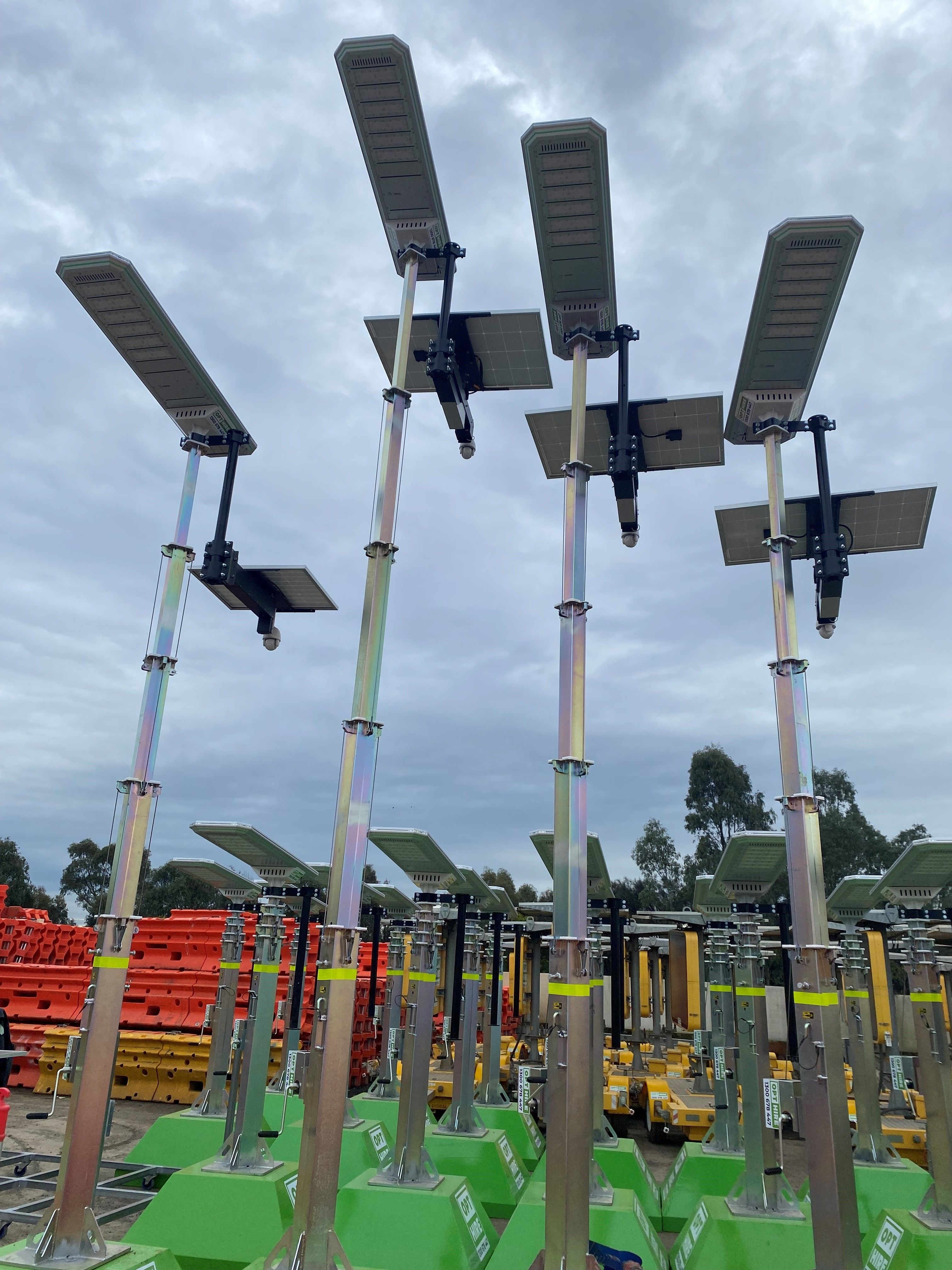 2 men standing in front of tower