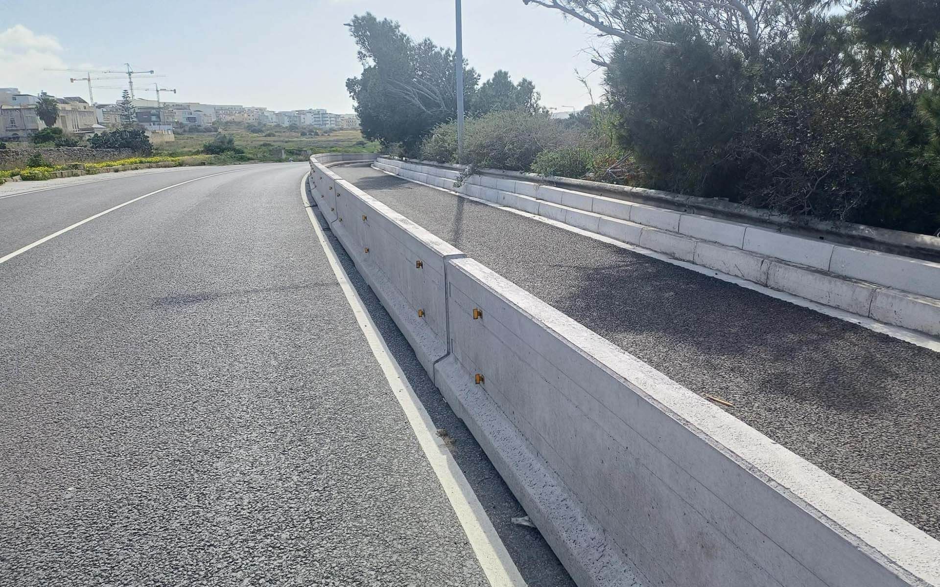 man writing on water barrier