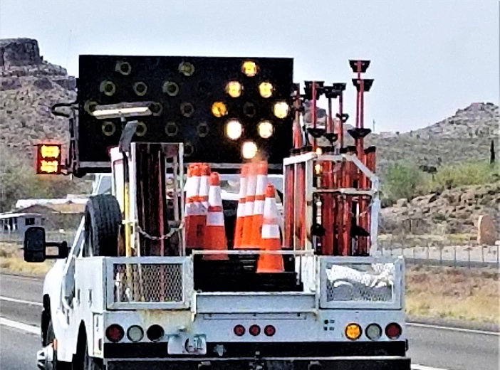 man writing on water barrier